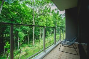 Un balcon sau o terasă la Okujozankei Onsen Kasho Gyoen