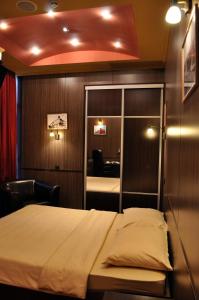 Postel nebo postele na pokoji v ubytování Hotel Fortuna