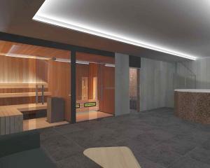 eine Lobby mit einem Schreibtisch und einem Tisch in der Unterkunft Apartmán B 101 Vysoké Tatry in Starý Smokovec
