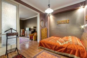 Säng eller sängar i ett rum på Danube Apartment Váci
