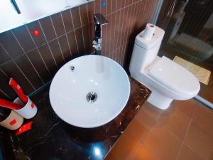 Ett badrum på Thank Inn Plus Hotel Jiangsu Suzhou Dushu Lake Dongxing Road