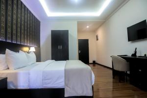 Voodi või voodid majutusasutuse BON Hotel Ikeja Residence toas