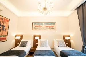Letto o letti in una camera di Archi di Roma Guest House