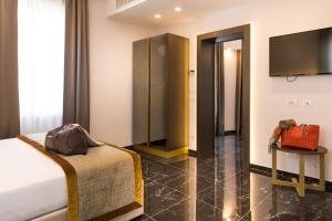 Ein Bett oder Betten in einem Zimmer der Unterkunft Villa Zaccardi