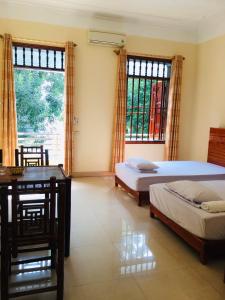 Giường trong phòng chung tại Newway Homestay Ninh Bình