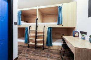 Postel nebo postele na pokoji v ubytování Zou Qu Ye Travel Hotel