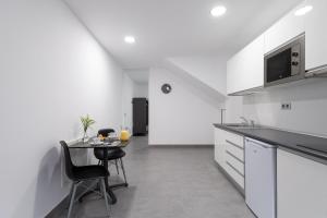 Köök või kööginurk majutusasutuses APARTAMENTOS BLUE EYES