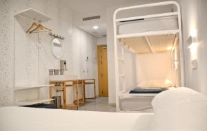 Postel nebo postele na pokoji v ubytování Loop INN Hostel Cartagena