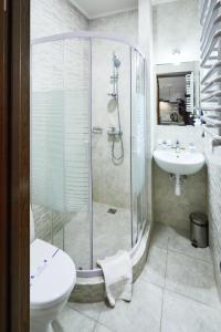 Ванна кімната в ANTARES Apart hotel