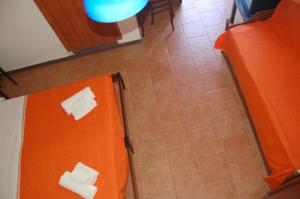 Voodi või voodid majutusasutuse Hotel Al Togo Fitness & Relax toas