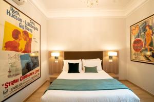Letto o letti in una camera di Archi di Roma Guest House