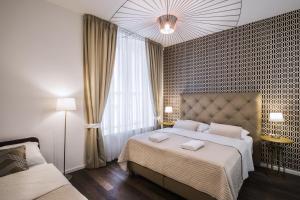Posteľ alebo postele v izbe v ubytovaní Luxury Modern Designed Oldtown Apartment