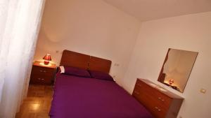 Posteľ alebo postele v izbe v ubytovaní Apartments Marusic