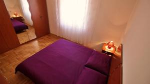 Posteľ alebo postele v izbe v ubytovaní Apartments Marusic