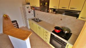 Kuchyňa alebo kuchynka v ubytovaní Apartments Marusic