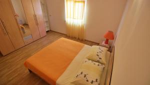 Posteľ alebo postele v izbe v ubytovaní Apartments Marusic