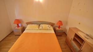 Posteľ alebo postele v izbe v ubytovaní Apartments Marusic