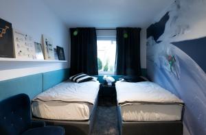 Postelja oz. postelje v sobi nastanitve Apartma Verdi Bc