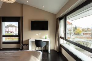 Voodi või voodid majutusasutuse Hotel Lo! im Kreuz Jona toas