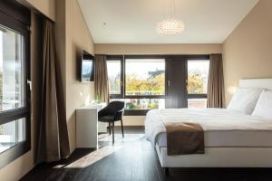 Voodi või voodid majutusasutuse Hotel Lo! im Kreuz Jona toas