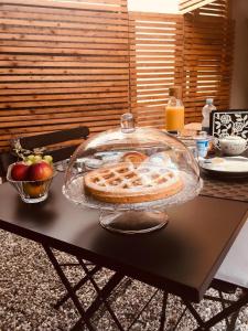 a cake in a glass dish on a table at ML32 in Ravenna +52 photos