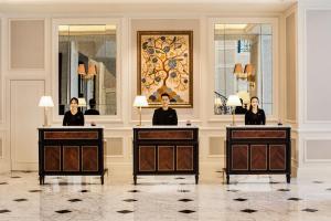Členové personálu v ubytování Mai House Saigon Hotel