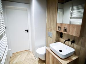 Kúpeľňa v ubytovaní ONE Apartamenty Gąsiorowskich 4