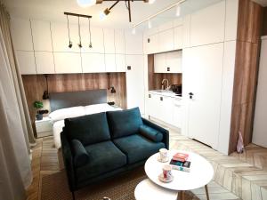 Posedenie v ubytovaní ONE Apartamenty Gąsiorowskich 4