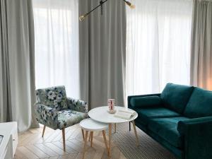 Posedenie v ubytovaní ONE Apartamenty Gąsiorowskich 4