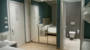 Kylpyhuone majoituspaikassa Gabbiano Hotel