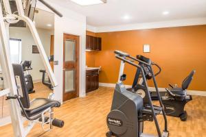 a gym with two treadmills and a treadmill at Comfort Inn near Frost Bank Center in San Antonio