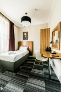 Voodi või voodid majutusasutuse The Place Hotel toas