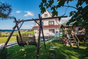 Vonkajšia záhrada v ubytovaní Apartament Na Wierchu