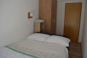 Ένα ή περισσότερα κρεβάτια σε δωμάτιο στο Apartments Jagoda