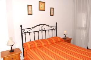 Postel nebo postele na pokoji v ubytování APCOSTAS - Atlanterra + 45 fotografií