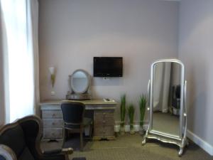 TV a/nebo společenská místnost v ubytování Hotel Commodore