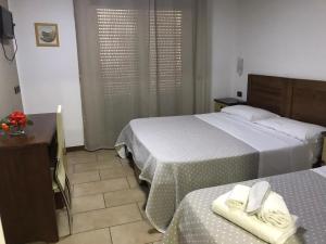 Postel nebo postele na pokoji v ubytování Hotel Fly