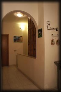 an entrance to a room with an open door at Casa Vacanze Cayohouse in Messina