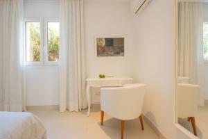 Łóżko lub łóżka w pokoju w obiekcie Villa Menorca 16