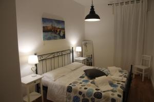 Postel nebo postele na pokoji v ubytování ES - Essential Solution & Emotion Stories (locazione turistica)