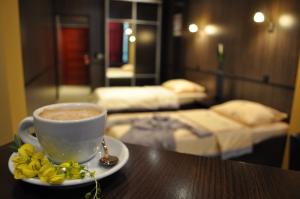 Postel nebo postele na pokoji v ubytování Hotel Fortuna
