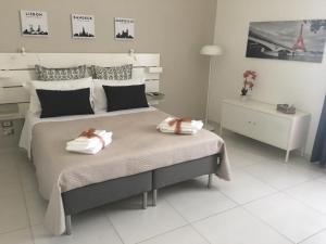Postel nebo postele na pokoji v ubytování Il profumo dei Sassi Holiday Home