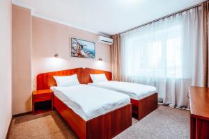 Lova arba lovos apgyvendinimo įstaigoje Black Sea Hotel Kyiv