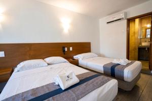Postel nebo postele na pokoji v ubytování Hotel Star