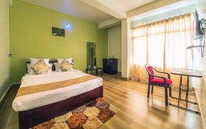 7 Sisters Falls View Inn客房内的一张或多张床位