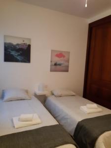 Postel nebo postele na pokoji v ubytování Apartamento Arena