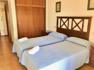 Postel nebo postele na pokoji v ubytování Albaida Apartment + 12 fotografií