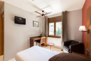 Posteľ alebo postele v izbe v ubytovaní Hotel Restaurant Castellarnau