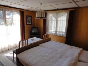 Letto o letti in una camera di Hotel Cima