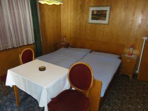 Letto o letti in una camera di Hotel Cima